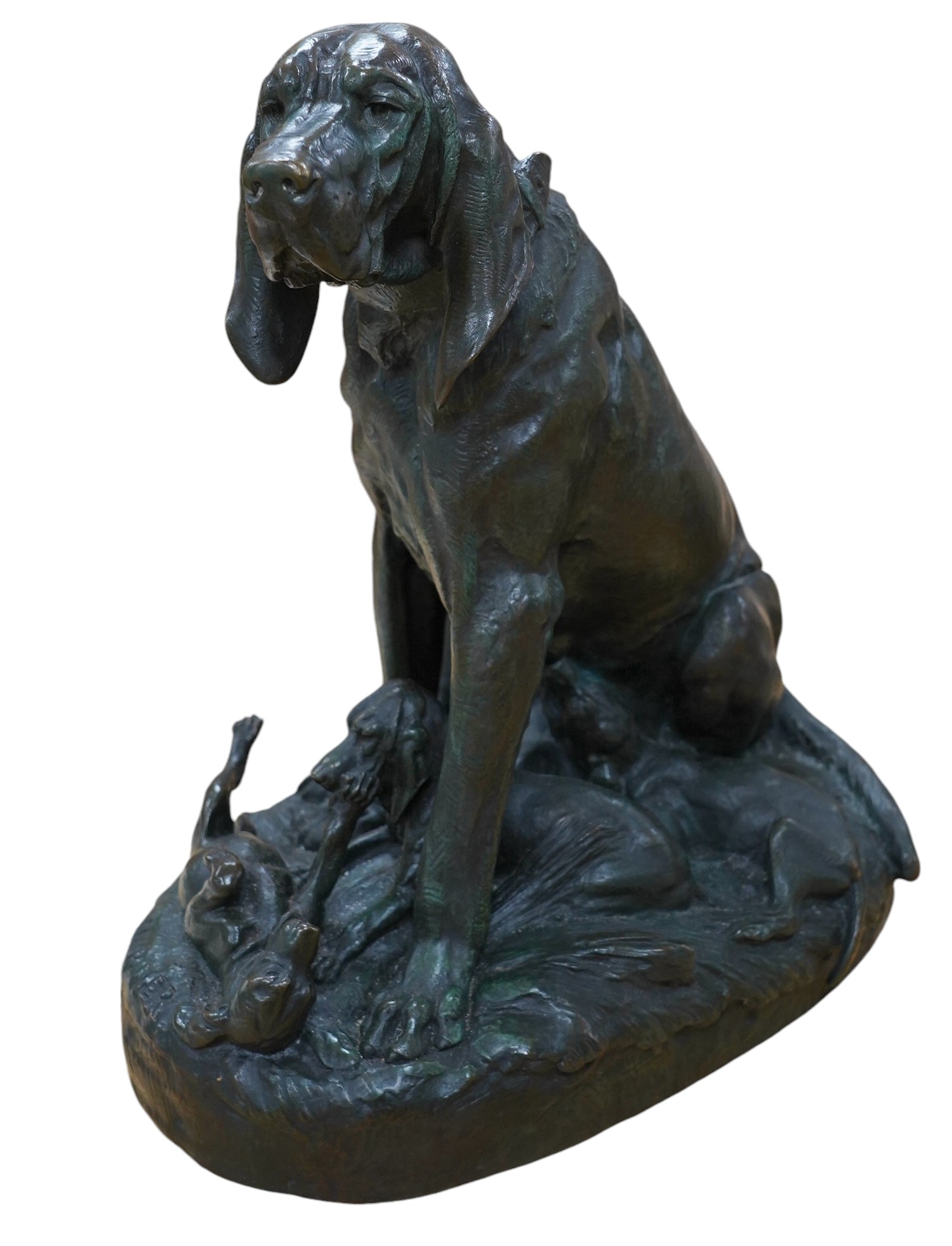 After Prosper Lecourtier (1855-1924), bronze model of a seated bloodhound and puppies, signed, 40cm tall. Condition - fair to good